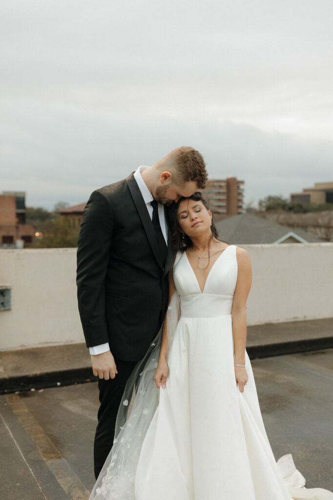 Intimate rainy day wedding portraits at 5eleven Palafox
