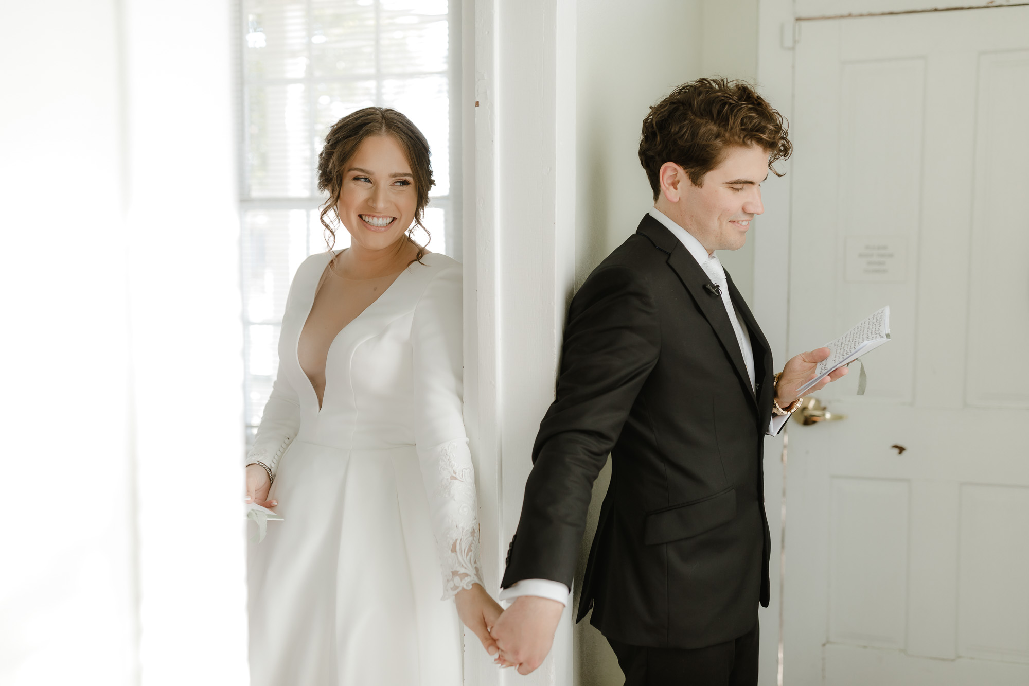 bride and groom sharing vows before ceremony