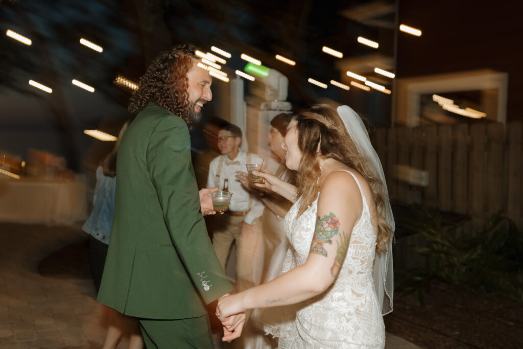 Grant and Mary dancing at their wedding reception at bayfront lodge and cabin