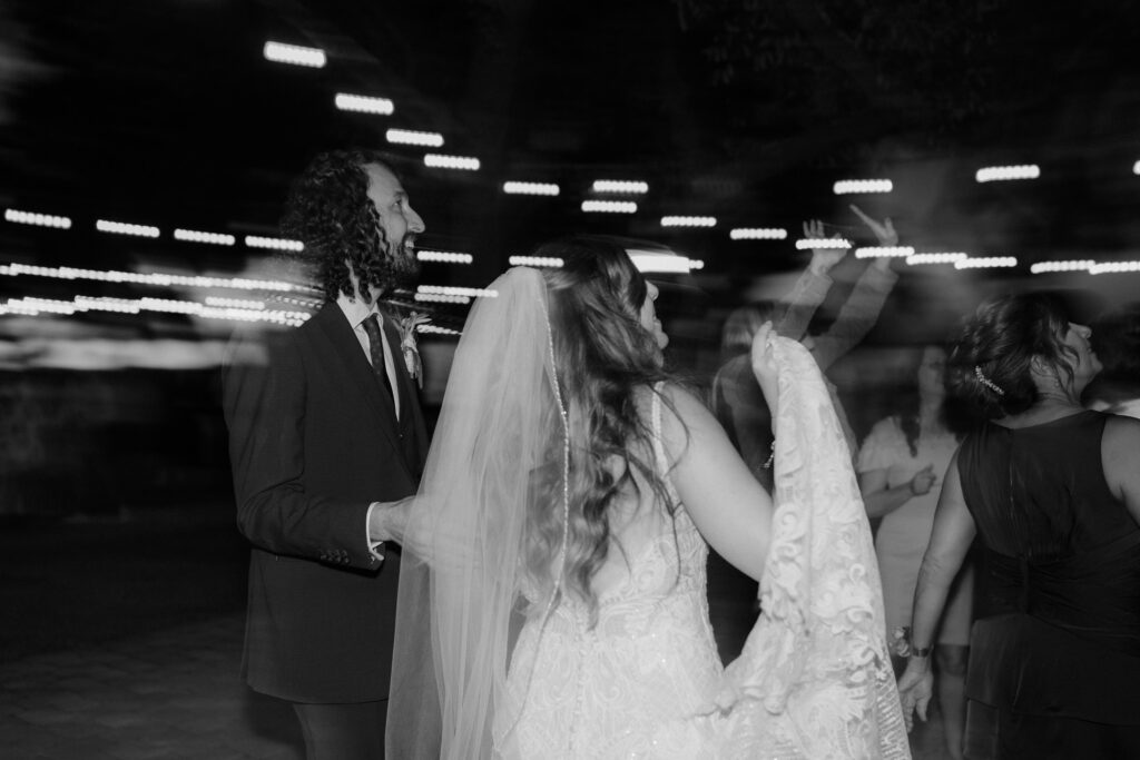 Grant and Mary dancing at their wedding reception at bayfront lodge and cabin