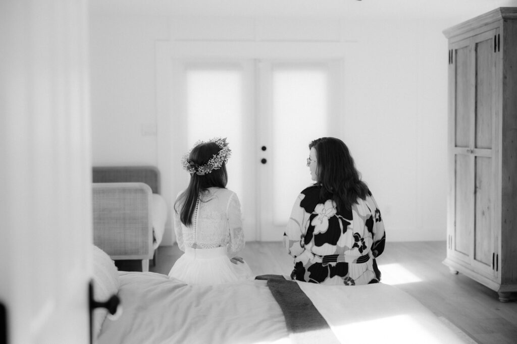 bride talking to family member before ceremony in quiet stress free wedding morning