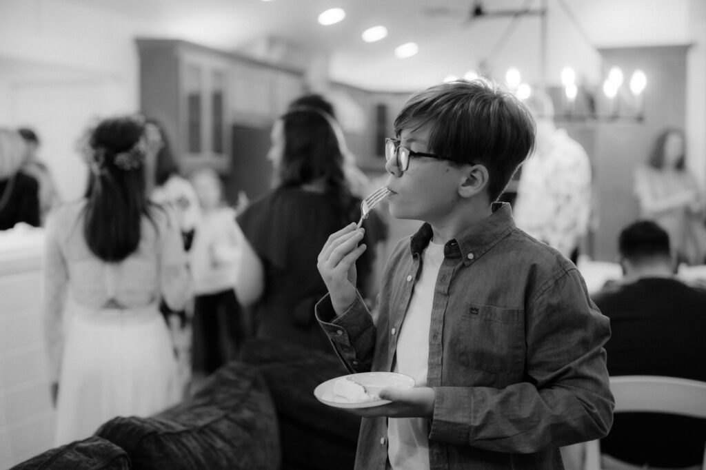 Eating cake with family after wedding dockside ceremony